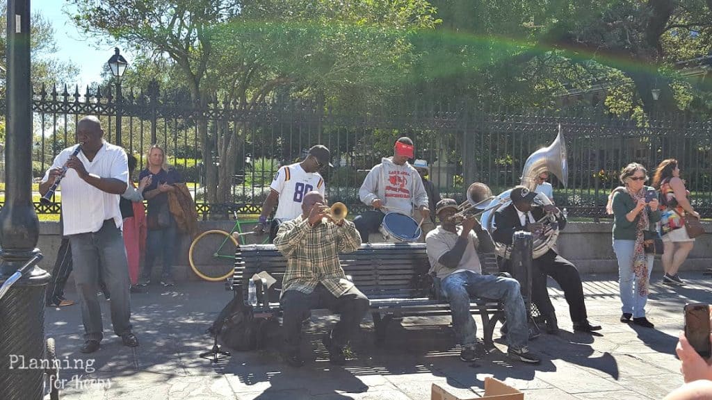 guys playing instruments in Jackson Square