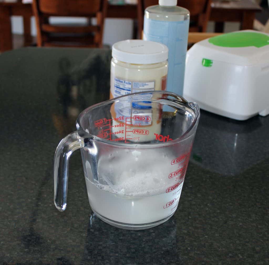 the cloth wipe solution in a four cup liquid measuring cup
