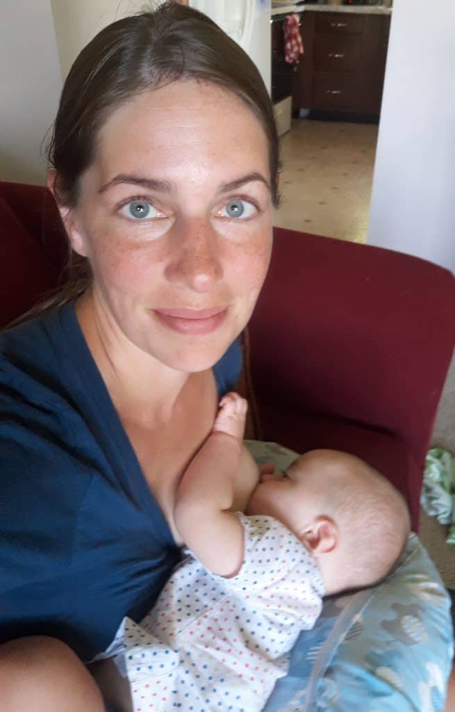 woman breastfeeding baby