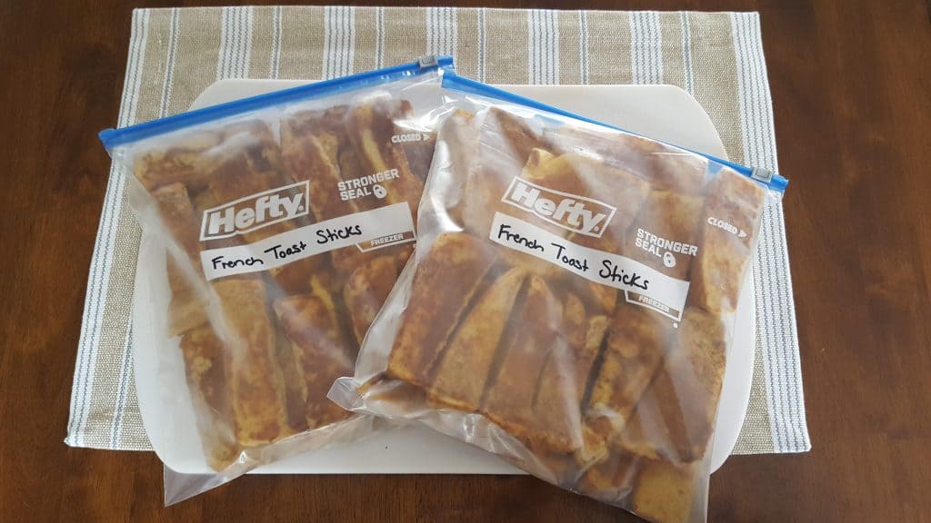 Two gallon-sized Ziploc bags filled with French Toast sticks