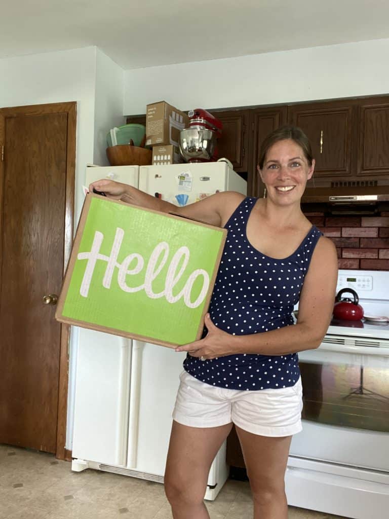 author holding a Hello Fresh box