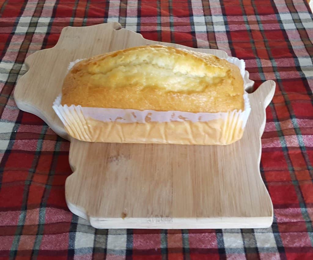 a loaf of pound cake on a cutting board