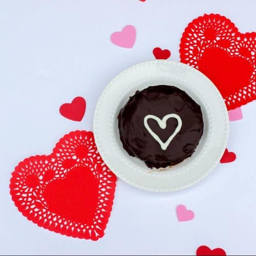 mini flourless chocolate cake with white chocolate heart garnish
