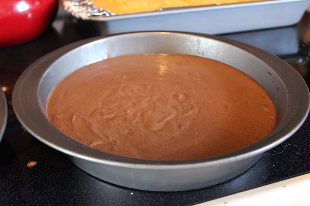 round cake pan with chocolate batter