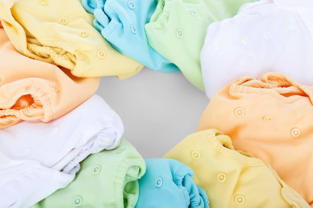 a circle of multi-colored cloth diapers