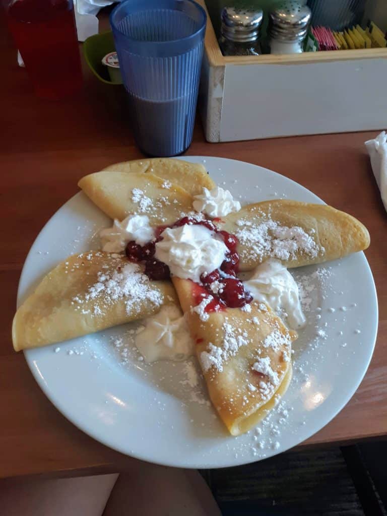 A plat of cherry crepes