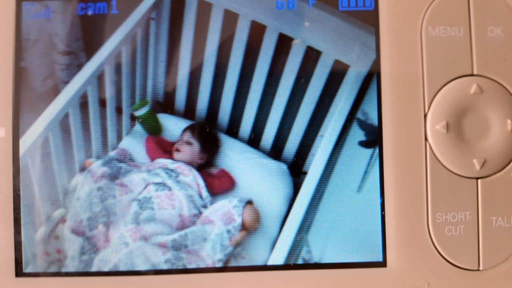 toddler shown on video monitor sleeping