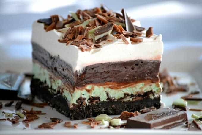 a square of chocolate mint dream bars showcasing the layers