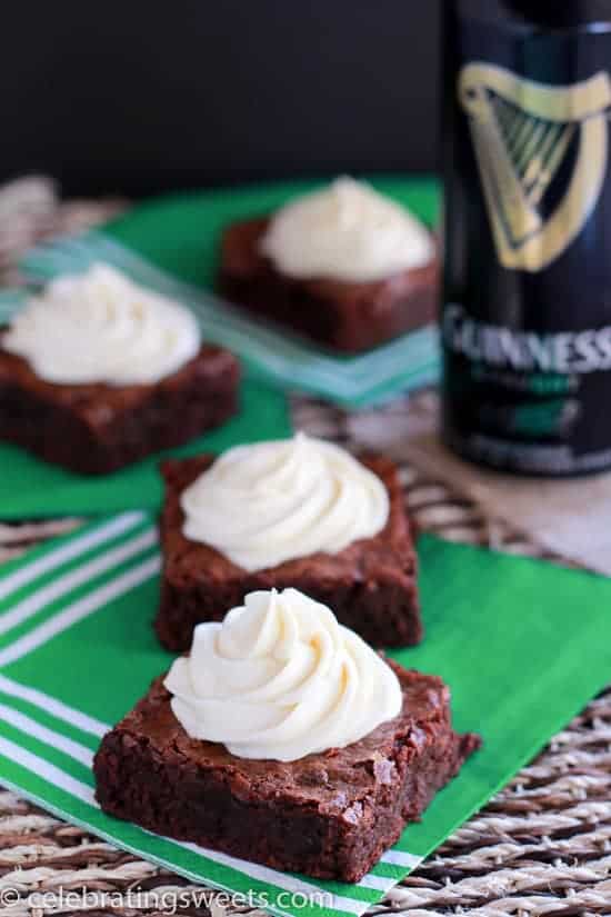 brownie squares with piped cream on top