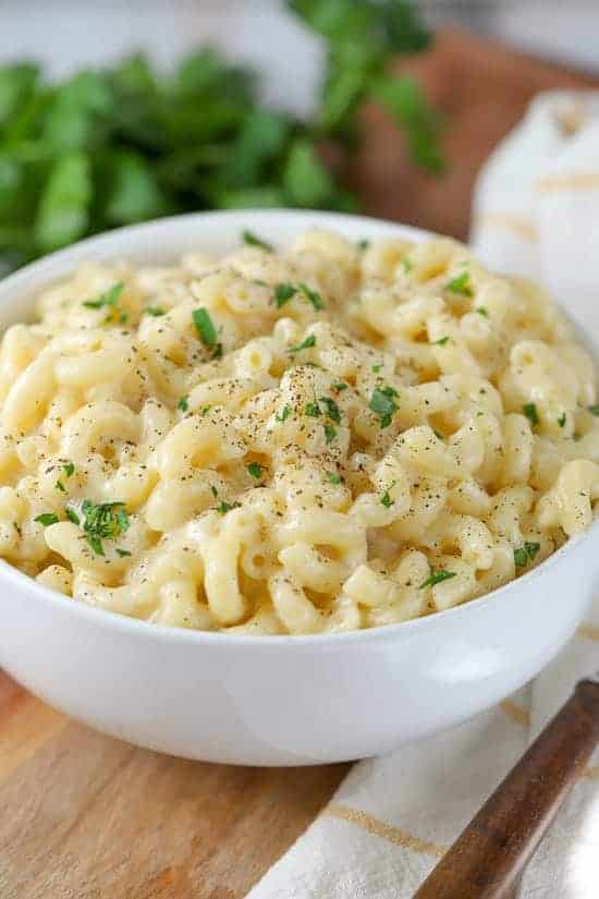 macaroni and cheese in a white bowl