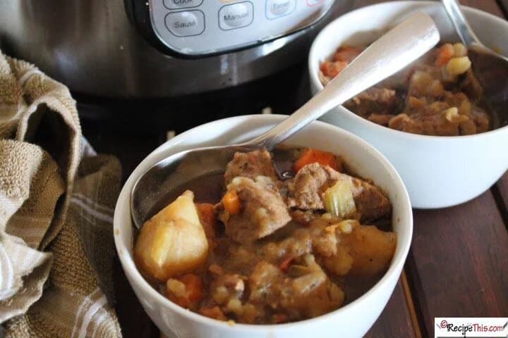 irish beef stew in a small white bowl