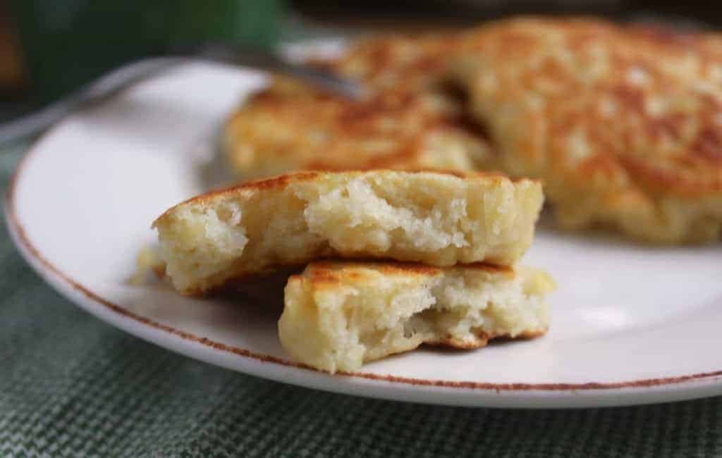 irish boxty on a plate sliced in half