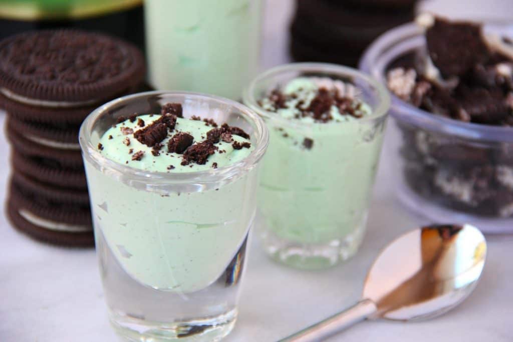 mint oreo pudding in a shot glass