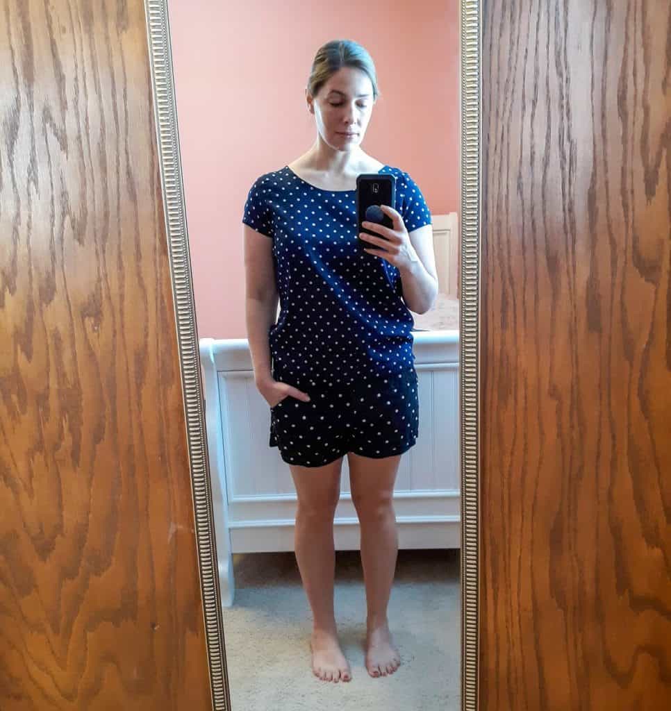 woman wearing polka dot top and shorts