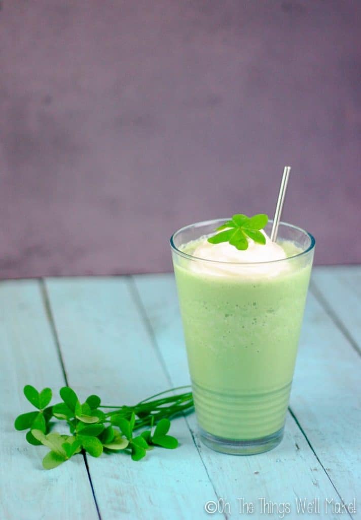 shamrock shake in a glass with a straw