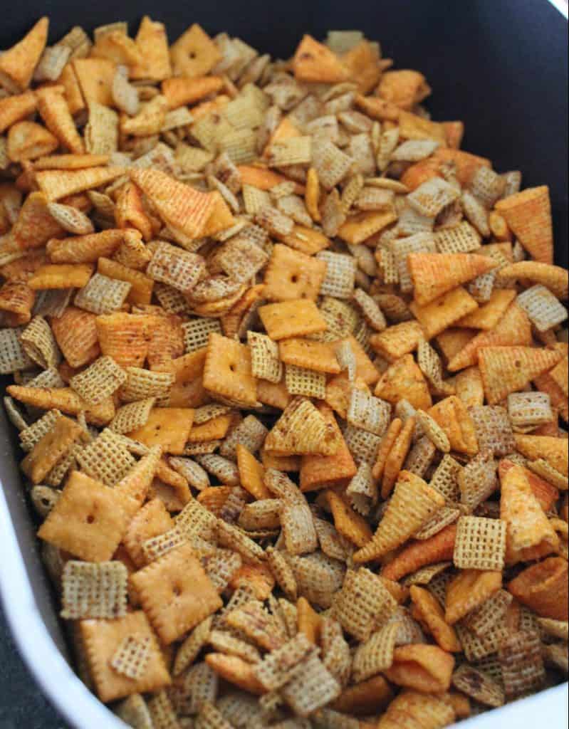 roasting pan full of Chex mix