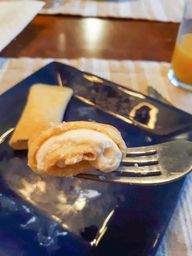 a crepe filled with lemon ricotta