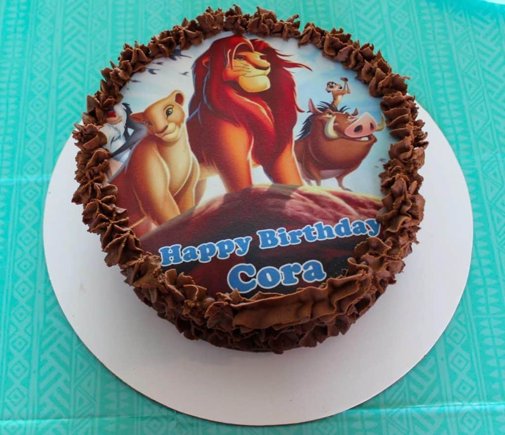 birthday cake with edible Lion King topper