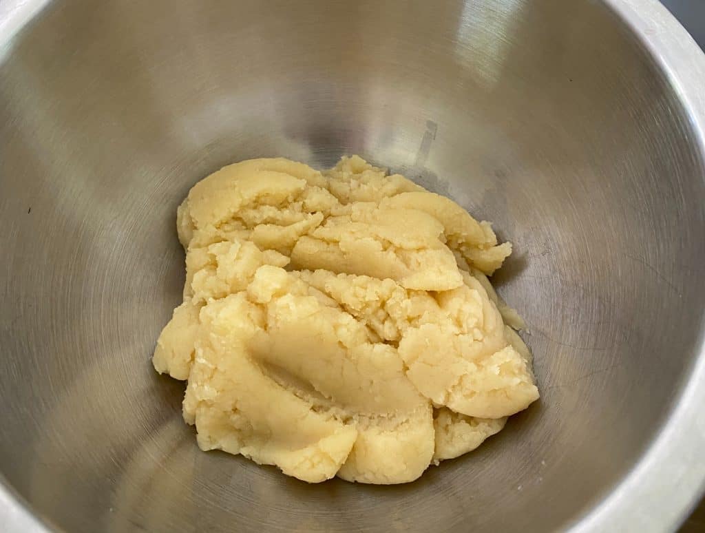 ball of pastry dough in mixing bowl