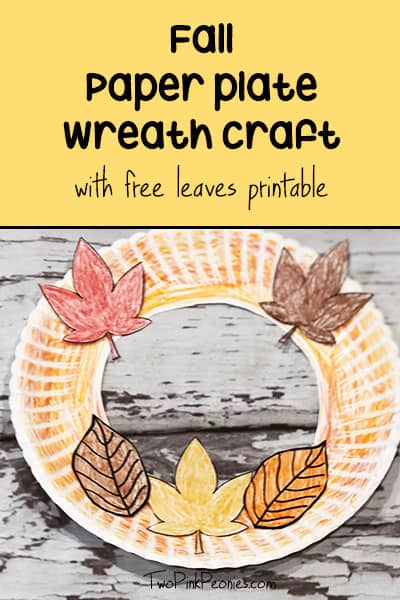 paper plate wreath with colored paper leaves