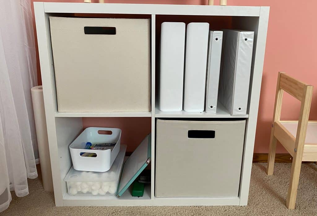 cube storage with fabric bins and binders