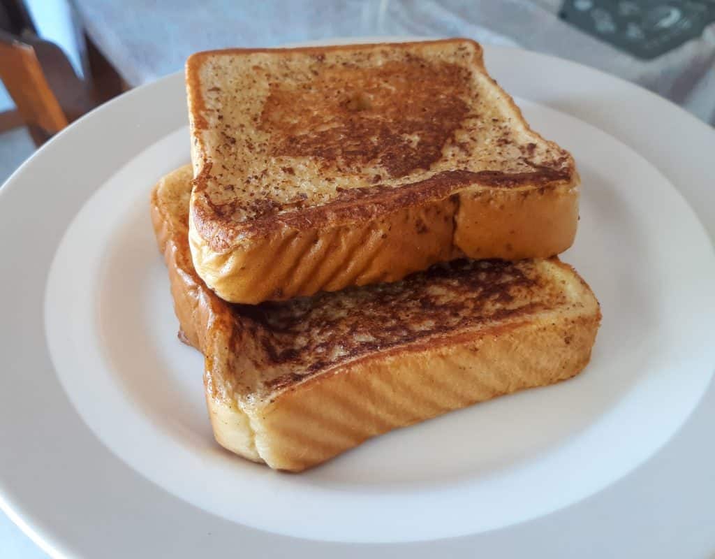 two slices of thick French toast on a plate