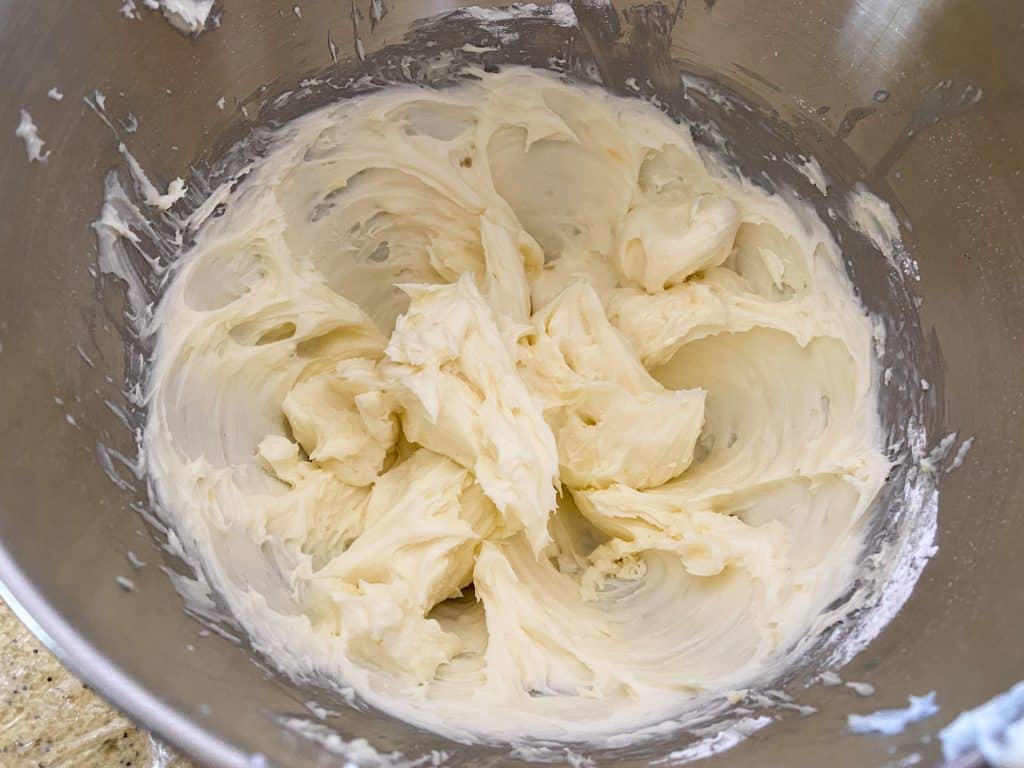 mixing bowl of lemon buttercream frosting