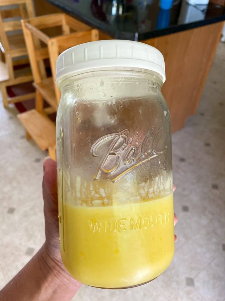 mason jar half full of lemon curd