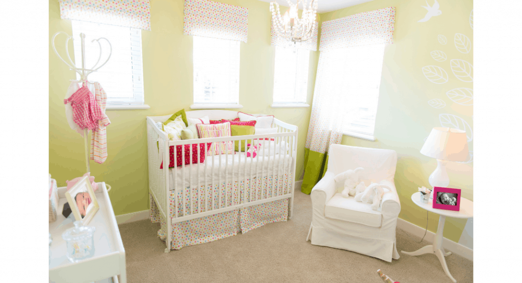 crib and chair in nursery