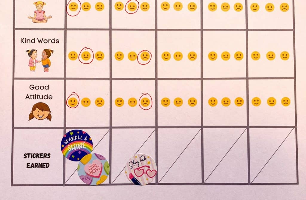 partially filled out weekly behavior chart with stickers