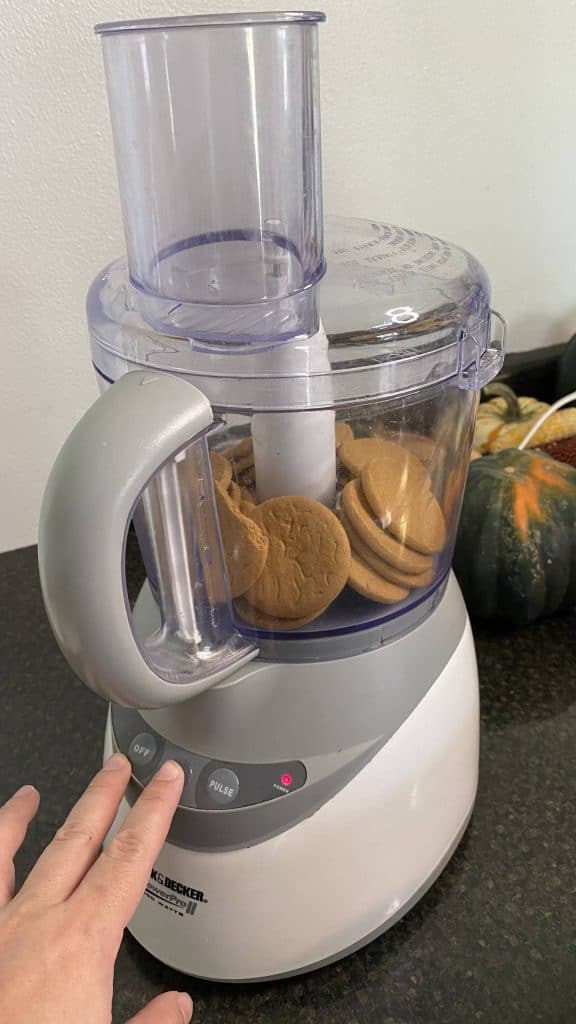 food processor full of ginger snap cookies