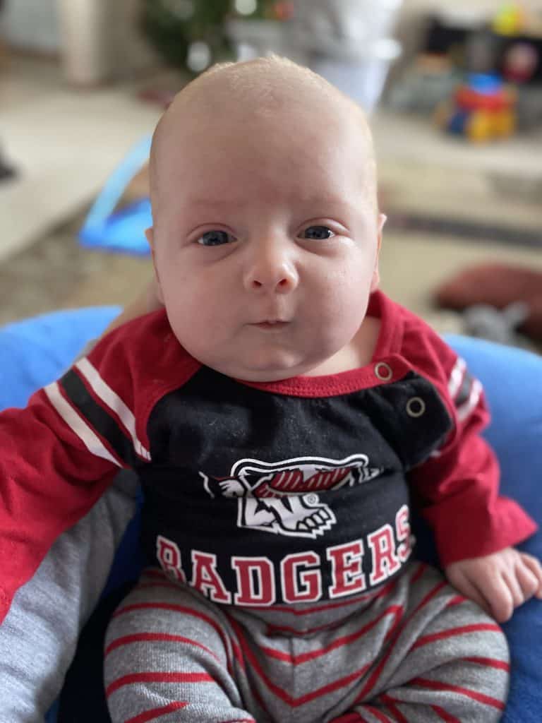 baby wearing a Wisconsin Badgers outfit