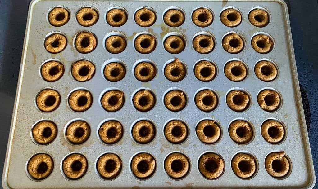 cookie cups cooling in muffin tin