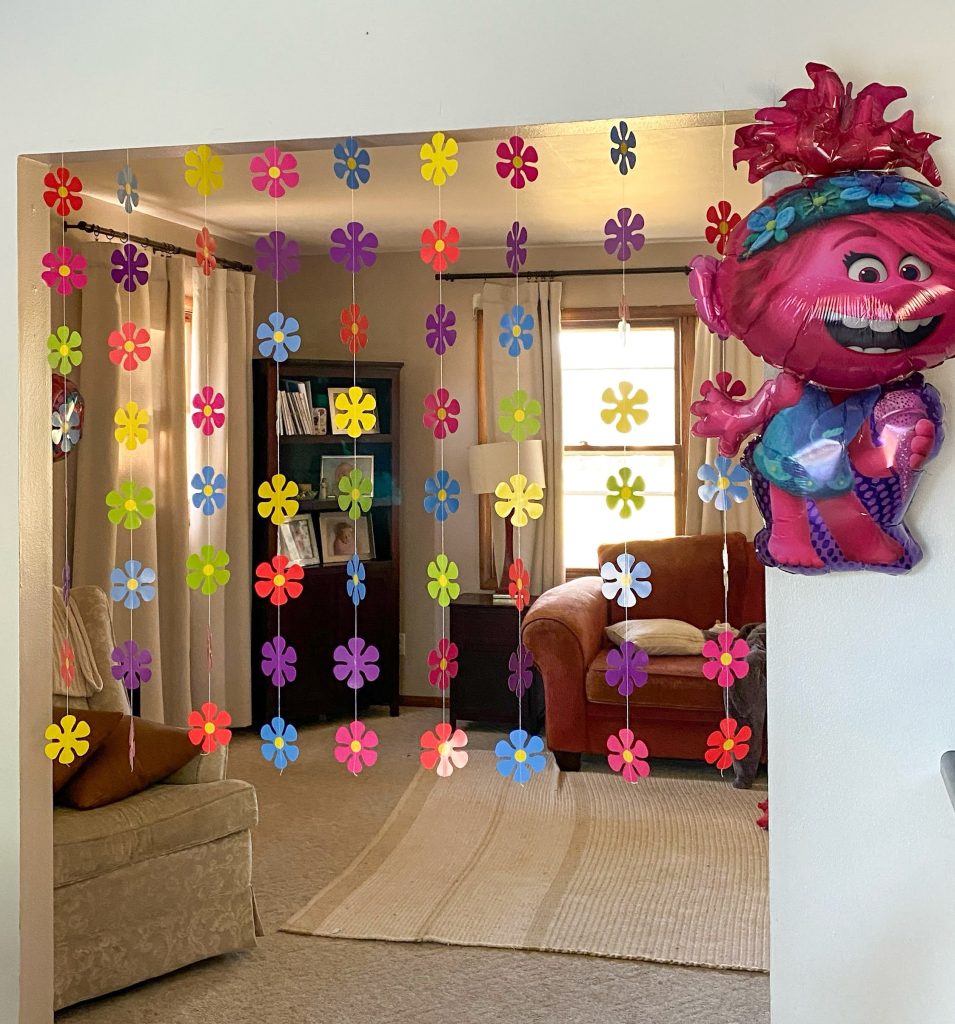 Hippie flower hanging decor and large Poppy Trolls balloon