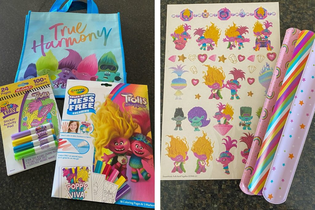 Trolls bag with Trolls tattoos, snap bracelets, and Trolls coloring sheets