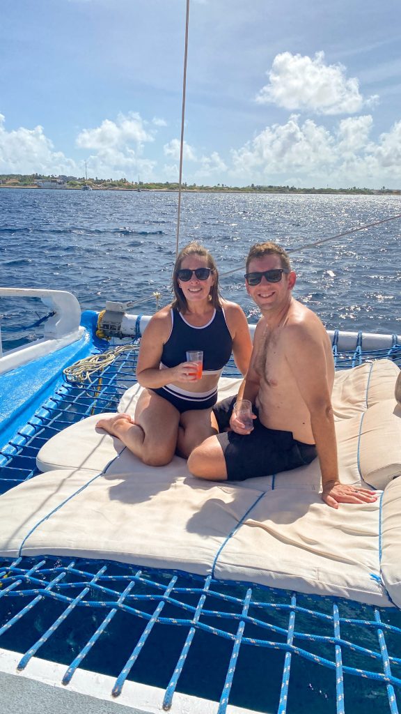 couple on catamaran