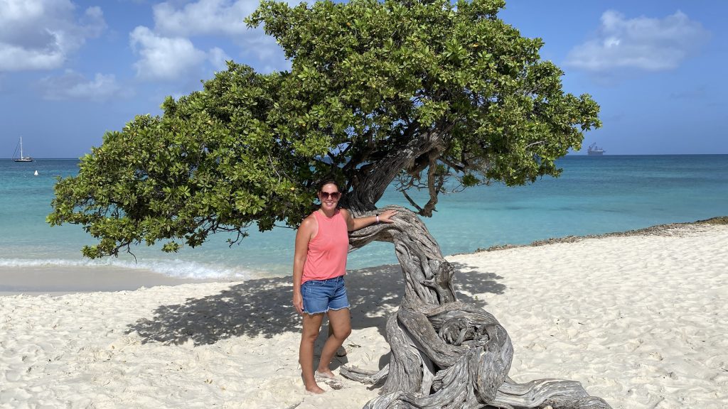 author in front of Fofoti tree on Eagle Beach