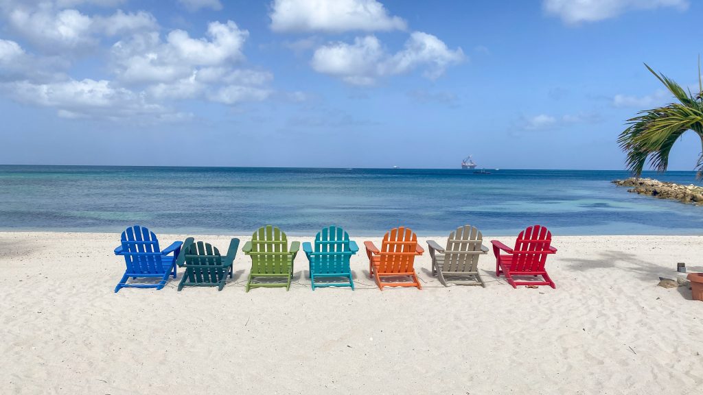 colorful Adirondack chairs on Palm Beach