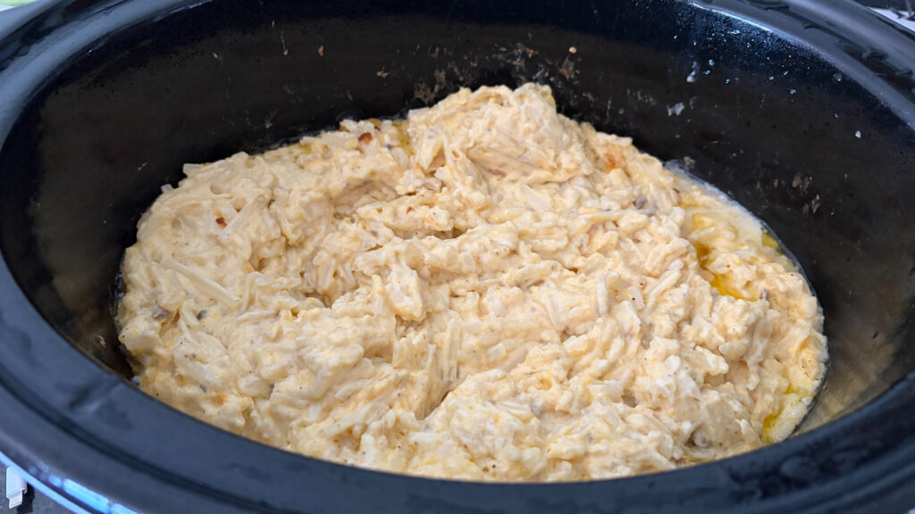 uncooked hash brown casserole in slow cooker