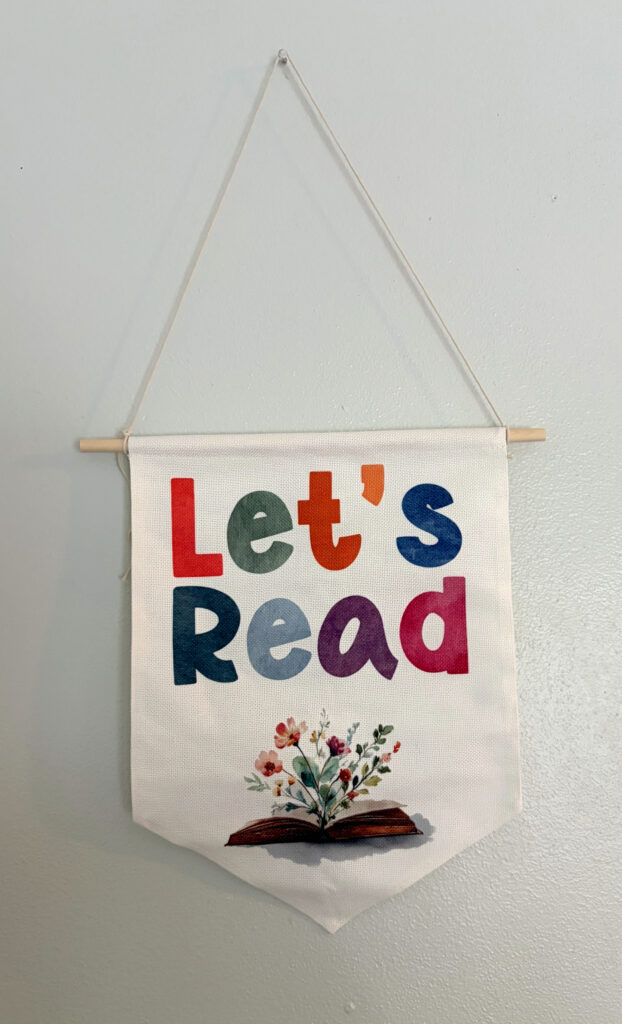 "Let's Read" book banner